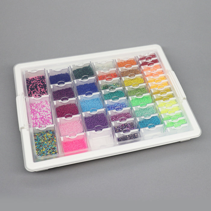 Embellishment Storage Tray & 45 empty assorted embellishment containers.